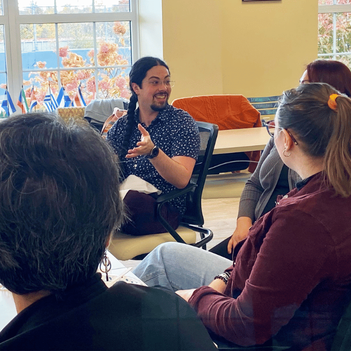 A Greylock employee teaches a class at the Community Empowerment Center